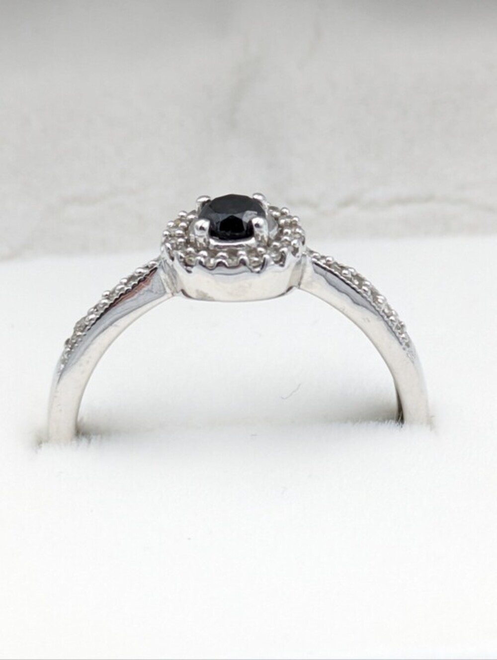 White gold 10k diamond and black diamond halo ring